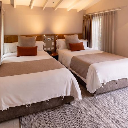 Termales El Otono Hotel La Enea Exterior photo A room at the hotel